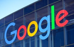 A shot of the outside of Google's office, with the logo displayed prominently.