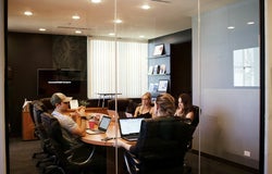 Managers conducting an interview in a meeting room